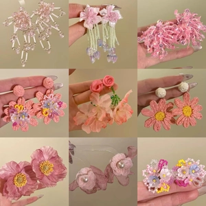 Pink floral fabric earrings set with tassels and pearls for beach vacation style