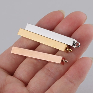 Polished stainless steel bar pendants in silver, gold, and rose gold for custom engraving