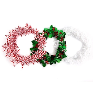 Christmas tree garlands with candy cane stripes, green berries, and white snowflake designs