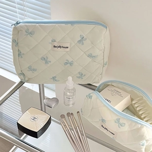 Quilted makeup bag set with blue bow pattern and double sizes for storage