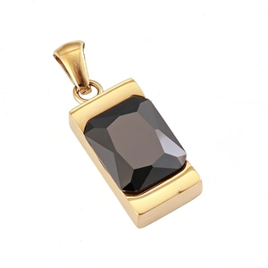 Detail of a minimalist gold rectangular pendant featuring a large emerald-cut black stone