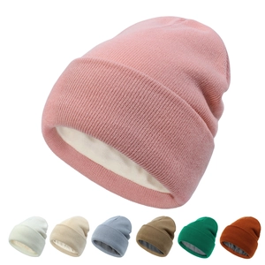 Fleece lined knit beanie for women in pink with various color options for winter warmth