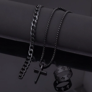 Three-piece black cross jewelry set including a Cuban bracelet, necklace and ring