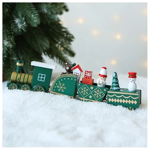 Detail of a four-section green wooden Christmas train featuring mini snowman and bear