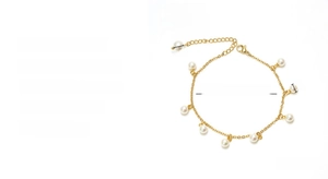 Detail of gold-plated stainless steel anklet with white pearls and 6cm extender chain