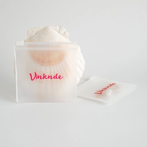 Frosted semi-transparent jewelry storage bag with red logo and secure zipper closure