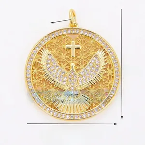 Detailed size specifications for a gold dove and cross pendant with zircon micro-pave