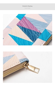Close-up of geometric triangle pattern and gold zipper detail on colorful faux leather wallet