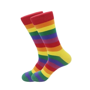 Detailed knit texture of crew socks featuring vibrant rainbow striped pattern design