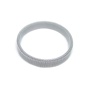 Macro detail of silver stainless steel stretch mesh band bracelet with woven texture