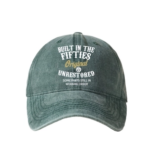 Vintage washed dark green baseball cap with Built in the Fifties slogan on front