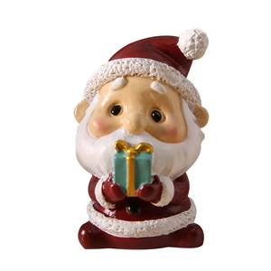 Cartoon resin Santa Claus figurine with blue gift box for Christmas tabletop decoration