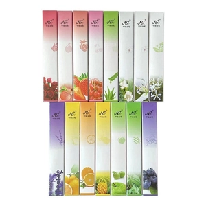 Set of 14 assorted scented nail cuticle oil pens with floral and fruit packaging designs