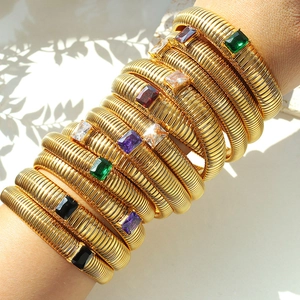 Gold-plated elastic snake bracelet with colorful rectangular zircon stones on model