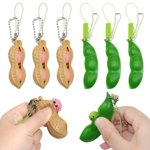 Squeeze bean and peanut keychain toy showing the pop-out beans with cute faces