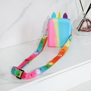 Detail of colorful rainbow unicorn silicone crossbody bag with adjustable donut print strap