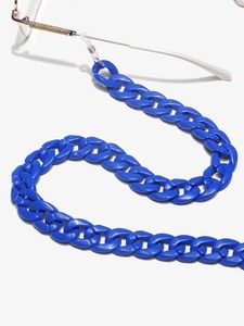 Detail of Klein blue acrylic glasses chain with white anti-slip rubber rings and thick links