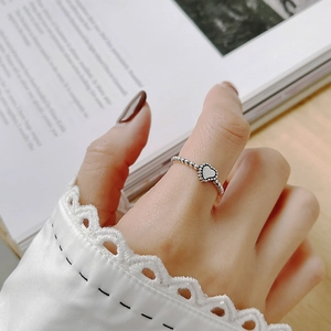 Retro 925 sterling silver heart-shaped beaded open ring shown on hand in artistic setting