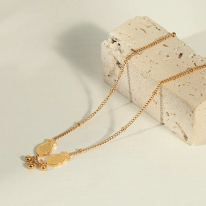 Minimalist golden titanium steel koi fish necklace with beads for women in Chinese style