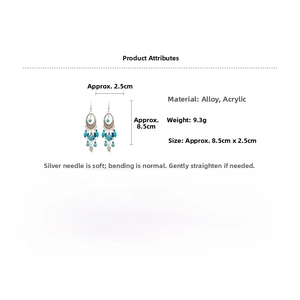 Detail view showing turquoise leaf drop earrings with dimensions 8.5cm by 2.5cm