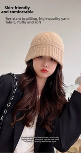 Close-up of beige chunky knit beanie showing anti-pilling texture and high elasticity