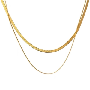 Elegant gold double-layered snake bone chain necklace with a minimalist flat metal design