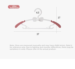 Detail of extendable plastic kids hanger showing telescopic width of 37cm and pink pads