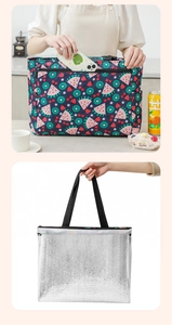 Detail of insulated picnic bag showing spacious fruit print exterior and silver foil lining