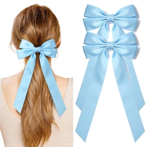 Light blue satin ribbon bow hair clip for women featuring long elegant streamers