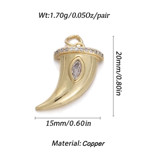 Macro view of gold copper horn pendant with small zircons and product measurements