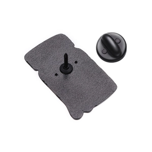 Detailed back view of a metal pin featuring the sharp needle post and black rubber clutch back