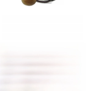 Macro view of wood bead belly ring with 316 stainless steel needle and 1.6mm rod thickness