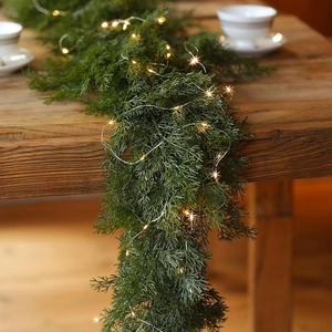 Lush PE artificial pine garland with warm LED copper wire lights for Christmas table decor
