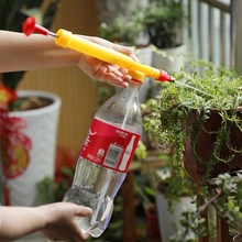 Detail of hand-operated pressure spray nozzle head for gardening spray bottles