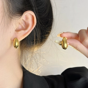 Polished gold teardrop earrings for women made of durable titanium steel for daily wear