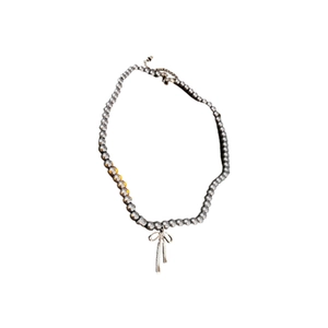 Collier vintage français élégant avec pendentif nœud et perles pour femmes chic
