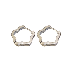 Minimalist silver hollow flower hoop earrings with sleek metallic irregular finish