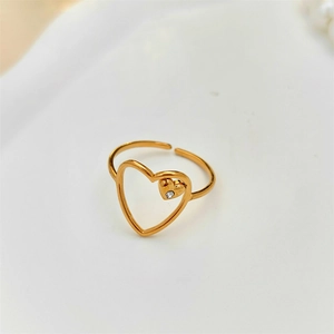 Detailed view of adjustable gold-plated double heart ring with sparkling rhinestone inlay
