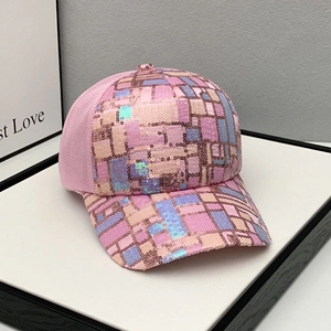 Detail view of pink sequin baseball cap showing breathable mesh and colorful patchwork
