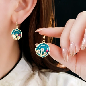 Vintage enamel earrings with blue finish, white pearl and red gemstone on gold base
