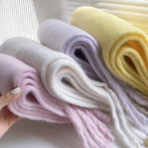 Thick warm mohair scarves in pink white purple and yellow with soft fringe tassels
