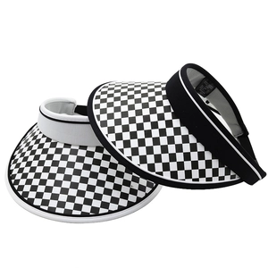 Detail of sun visors showing checkerboard brim patterns in black and white styles