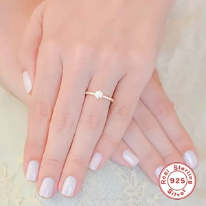 Elegant 925 sterling silver gold plated ring with classic six-prong solitaire diamond setting