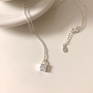 Minimalist S925 sterling silver necklace featuring a square zircon padlock pendant