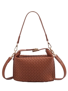Brown woven leather shoulder bag with top handle and adjustable straps on white background