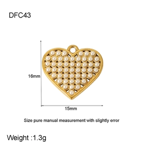 Detail of 16mm gold plated heart pendant with embedded pearls and size specifications