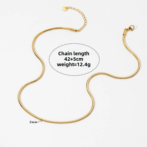 Detail of 2mm gold snake chain necklace with lobster clasp and adjustable extension chain