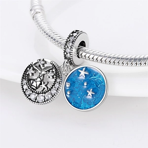 Silver ocean turtle charm with blue enamel and sparkling cubic zirconia on snake chain