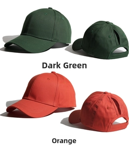 Detail of adjustable ponytail opening and cotton twill fabric on back of baseball cap