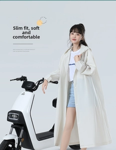 Close-up of long hooded white translucent EVA raincoat for electric bike riders